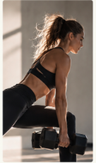 Woman building strength with a dumbbell